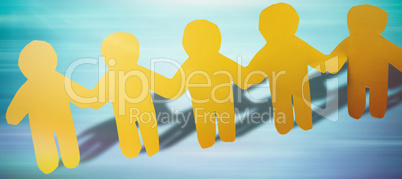 Composite image of yellow hand holding paper