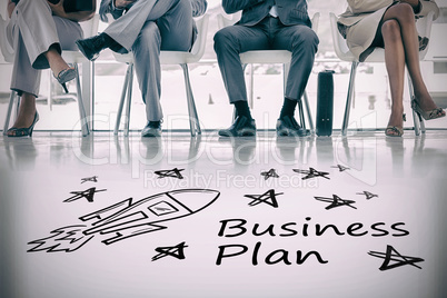 Composite image of digital image of rocket and star shapes with business plan text