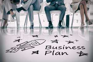 Composite image of digital image of rocket and star shapes with business plan text