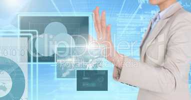 Businesswoman touching and interacting with technology interface panels