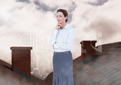 Businessman standing on Roofs with chimney and cloudy city