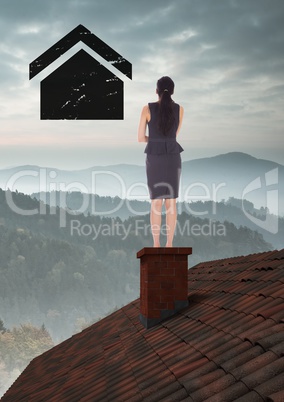 Businesswoman on roof looking at home icon