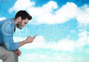 Man on phone under sky clouds