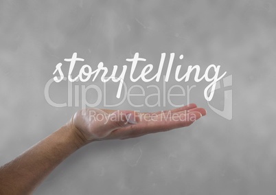 Hand interacting with storytelling business text against grey background