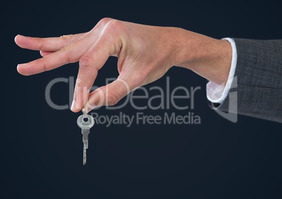 Business man holding keys