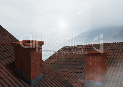 Roofs with chimney and cloudy mountains