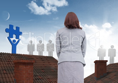 People icons with puzzle piece Businesswoman standing on Roofs with chimney and and blue sky