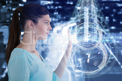 Composite image of young woman using digital screen