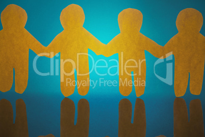 Composite image of 4 yellow paper person holding hands