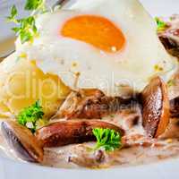 Forest mushroom sauce with fresh mushrooms, potato and poached e