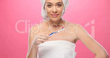 Pretty woman with toothbrush
