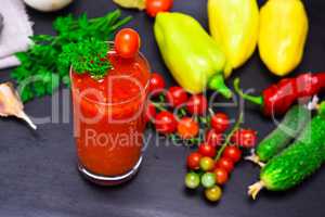 juice from a red tomato in a glass