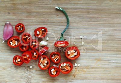 Hot chili pepper chopped on a cutting board