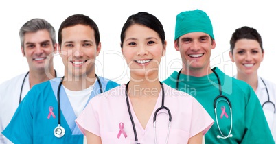 Doctors with breast cancer awareness ribbon