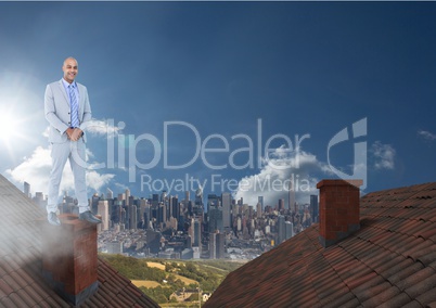Businessman standing on Roofs with chimney and city