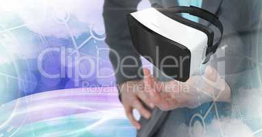 Hands touching and interacting with virtual reality headset with transition effect