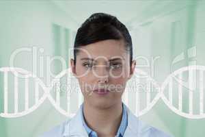 Doctor woman standing with DNA strand