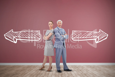 Composite image of serious businessman standing back to back with a woman