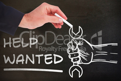 Composite image of hand holding a chalk and writing something