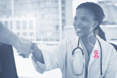 Composite image of breast cancer awareness ribbon