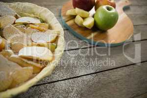 High angle view of apple pie preparation