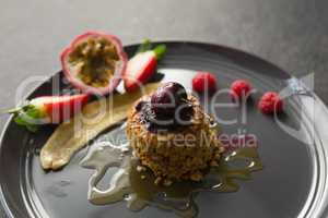 Healthy breakfast with fruits in a plate