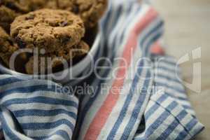 High angle view of cookies in bowl on napkin