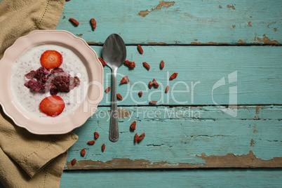 Yogurt and fruits in bowl