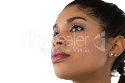 Close up of thoughtful young woman