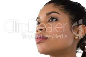 Close up of thoughtful young woman