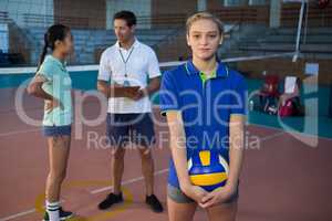 Portrait of volleyball player holding ball