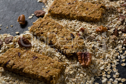 Granola bar with scattered oatmeal