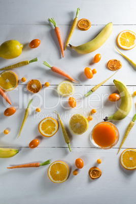 Overhead view of various fruits arranged on table