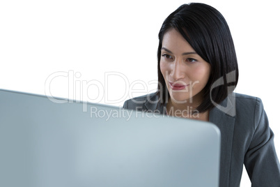 Businesswoman working on desktop pc