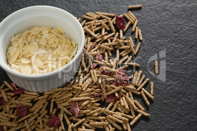 Bowl of corn bran with cereal bran stick spread