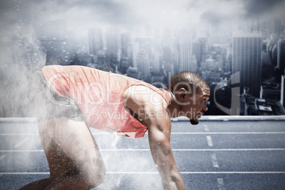 Composite image of profile view of runner preparing for the start