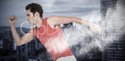 Composite image of male athlete running on white background