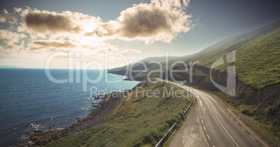 Road by sea against sky