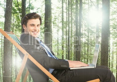 Businessman in nature forest