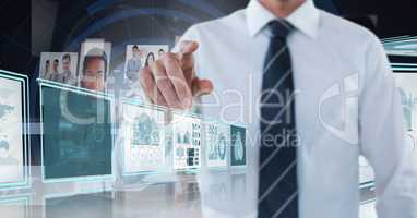 Businessman touching and interacting with technology interface panels