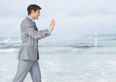 Businessman by sea