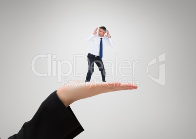 Small business man standing on the big business woman hand