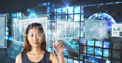 Businesswoman touching and interacting with technology interface panels