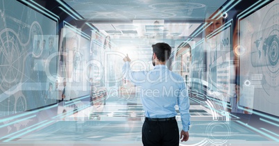 Businessman touching and interacting with technology interface panels