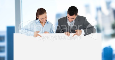 Business people holding blank card in office