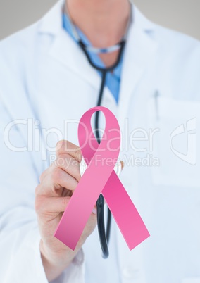 Doctor man with breast cancer awareness ribbon