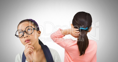 Two girls looking around