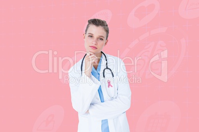 Doctor woman with breast cancer awareness ribbon