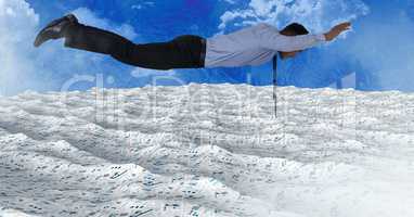 Businessman flying over sea of documents under sky clouds