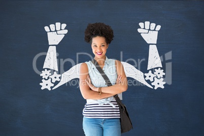 Student woman with fists graphic standing against blue blackboard